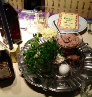 seder plate with Manischewitz wine.JPG