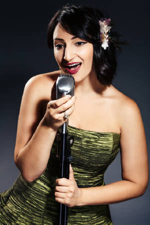 Allegra in green dress promo shot.jpg