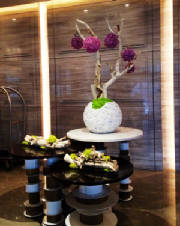 flowers in Beijing Hilton Wangfujing lobby.JPG