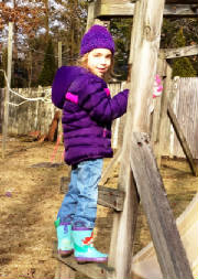 Caroline climbing monkey bars.jpg