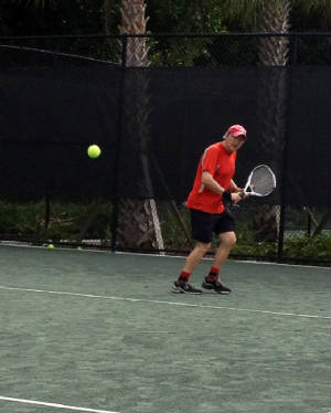 Harlan never tires of playing tennis (yawn!).JPG