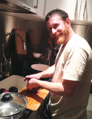 Matt cooking in Hong Kong on Rosh Hashanah.JPG