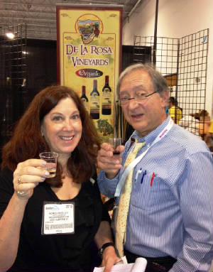 Pattie and Harlan at De La Rosa booth.JPG