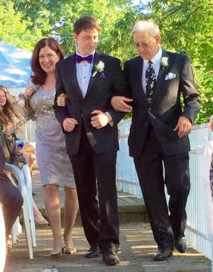 Walking Aidan down the aisle.jpg