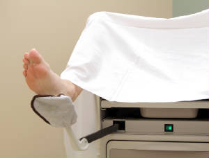 feet in the stirrups for a gynecological exam.jpg