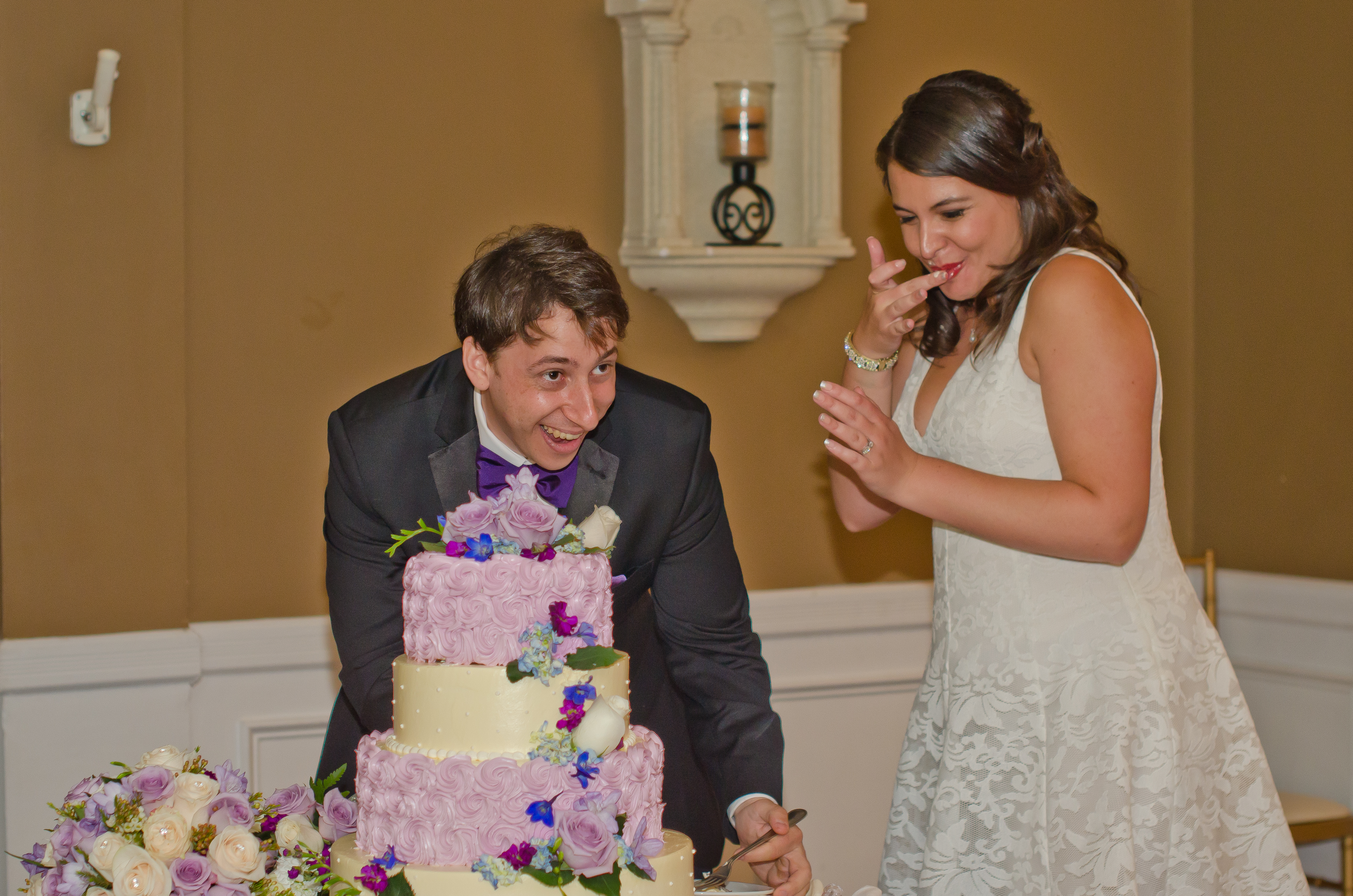 Aidan and Kaitlin with wedding cake.jpg