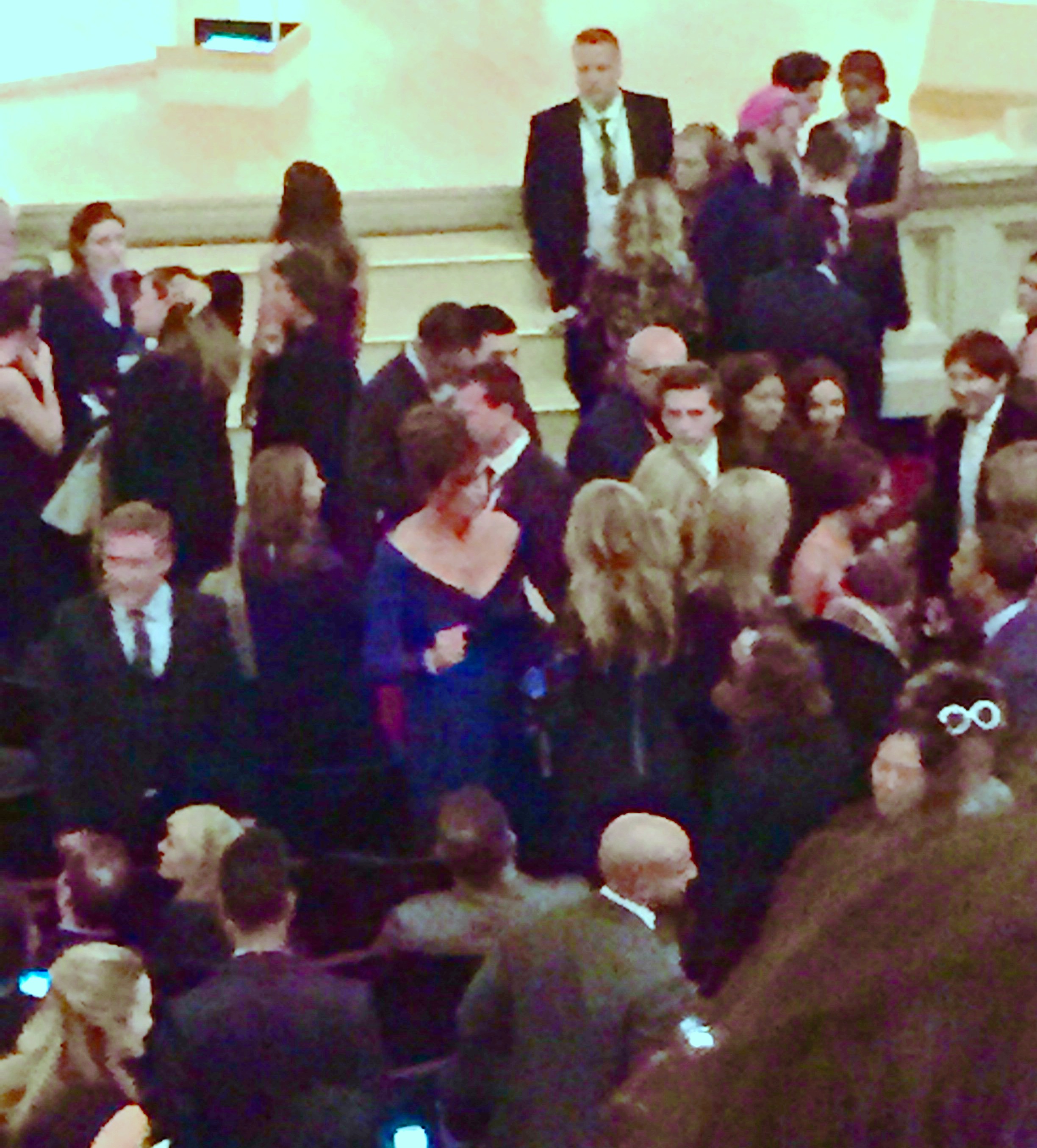 Caitlyn Jenner (in blue) in the distant crowd.jpg