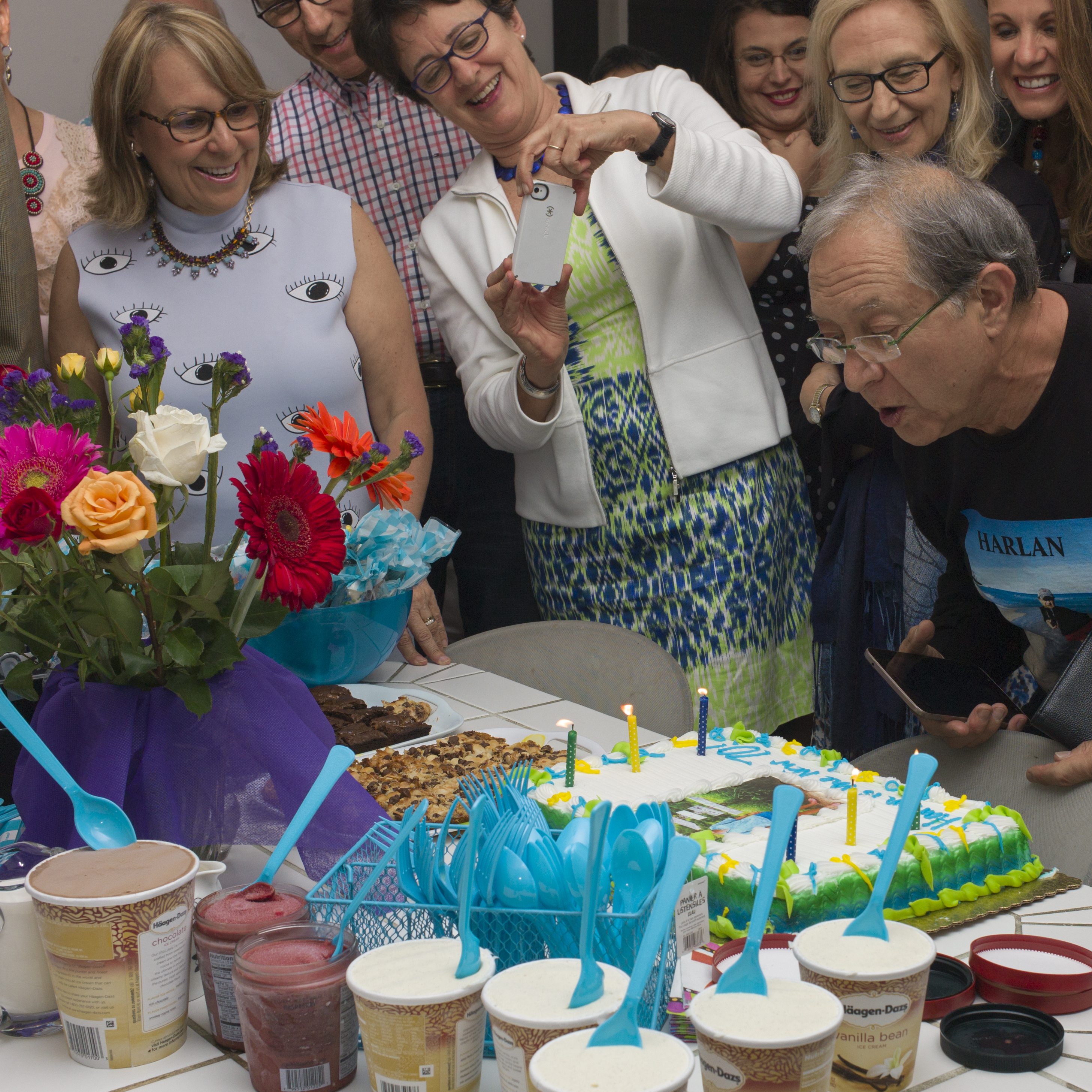 Harlan's 70th blowing out the candles.jpg