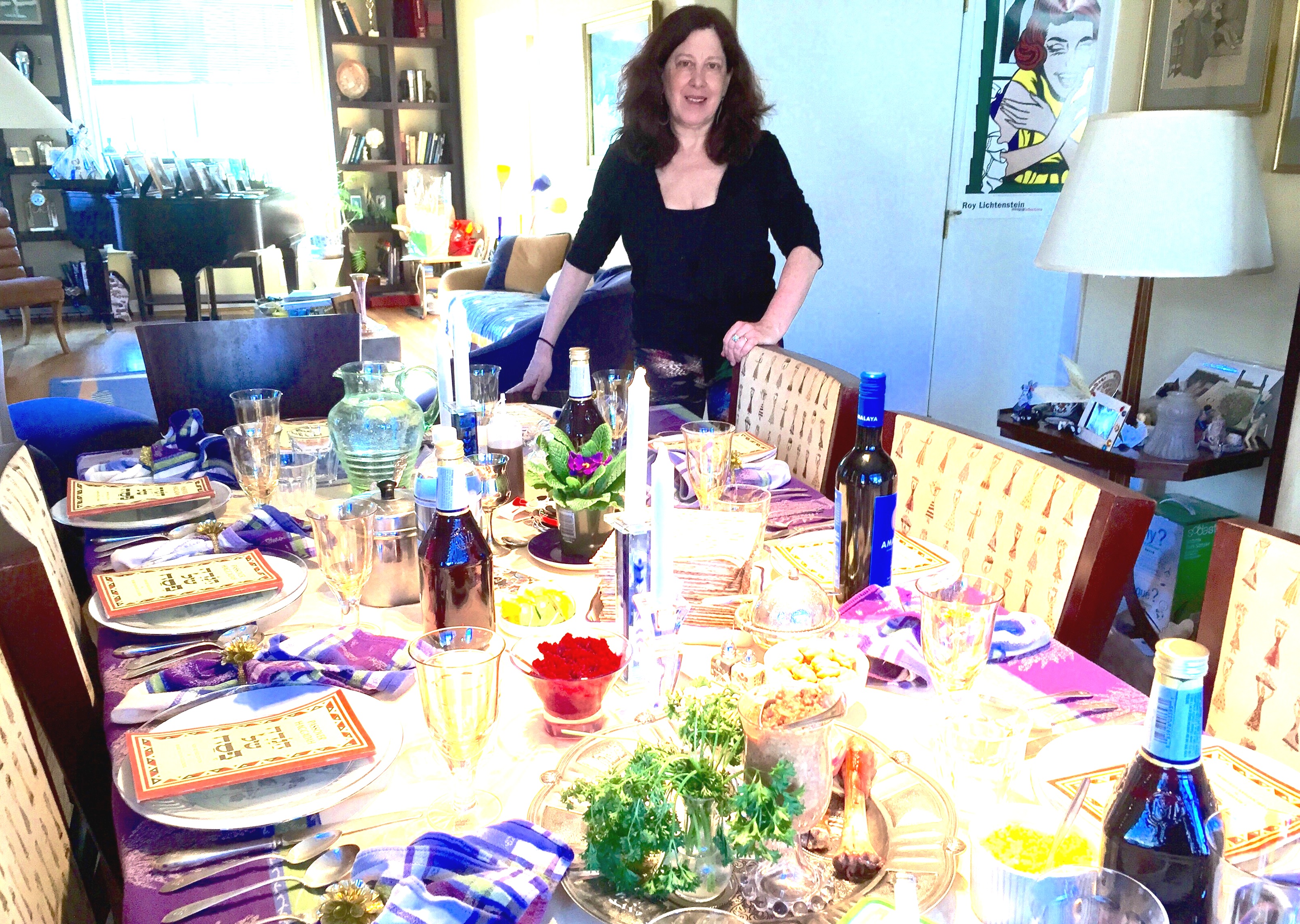 Pattie with Passover table.JPG