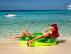 Redheadbaskingonbeach.jpg