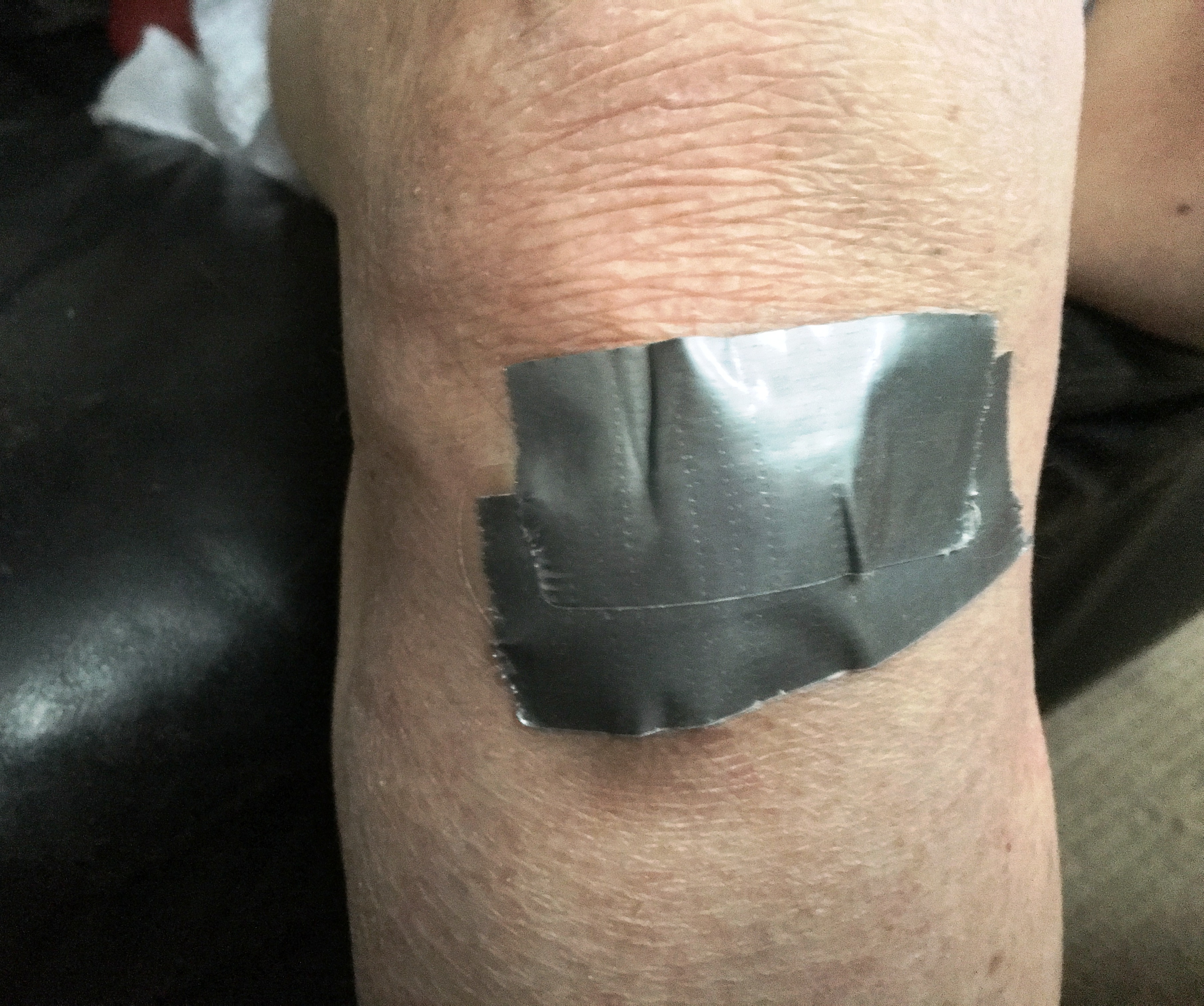 I covered my knee with duct tape.JPG