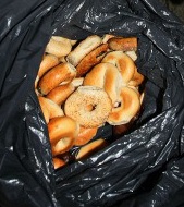 They dump dozens of bagels in the trash.jpg